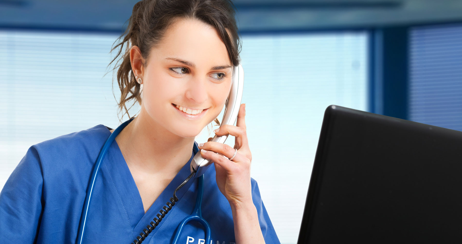 Nurse on Phone Prime Stock Photo